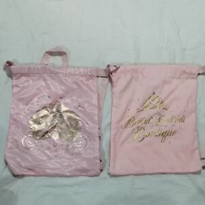 Set of Two Bibbidi Bobbidi Boutique Pink Drawstring Backpacks with Gold Accents